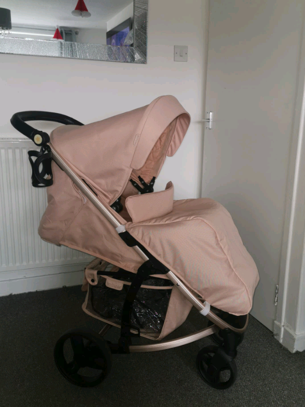 pink and rose gold stroller